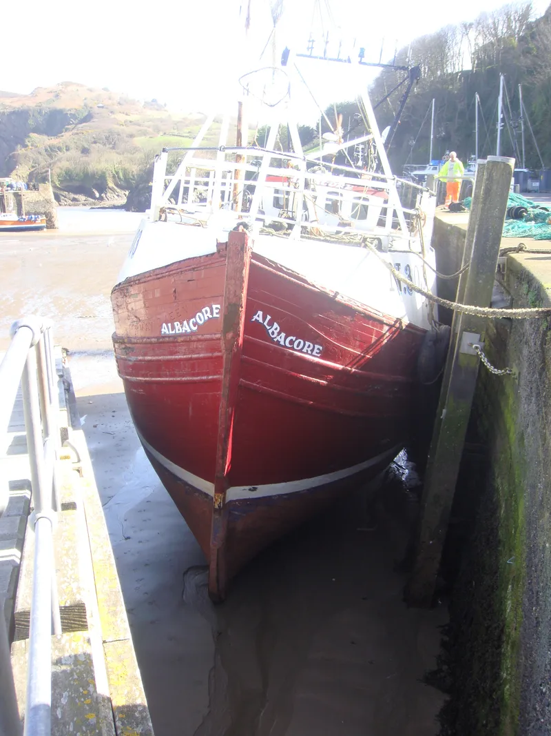Fishing trawler ‘Albacore’ moored at Ilfracombe harbour at low tide