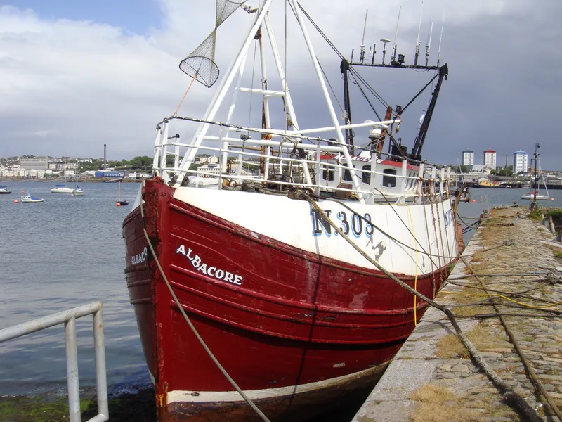 Fishing trawler ‘Albacore N303’ moored against the wall of the Ballast Pound at Torpoint in Cornwall