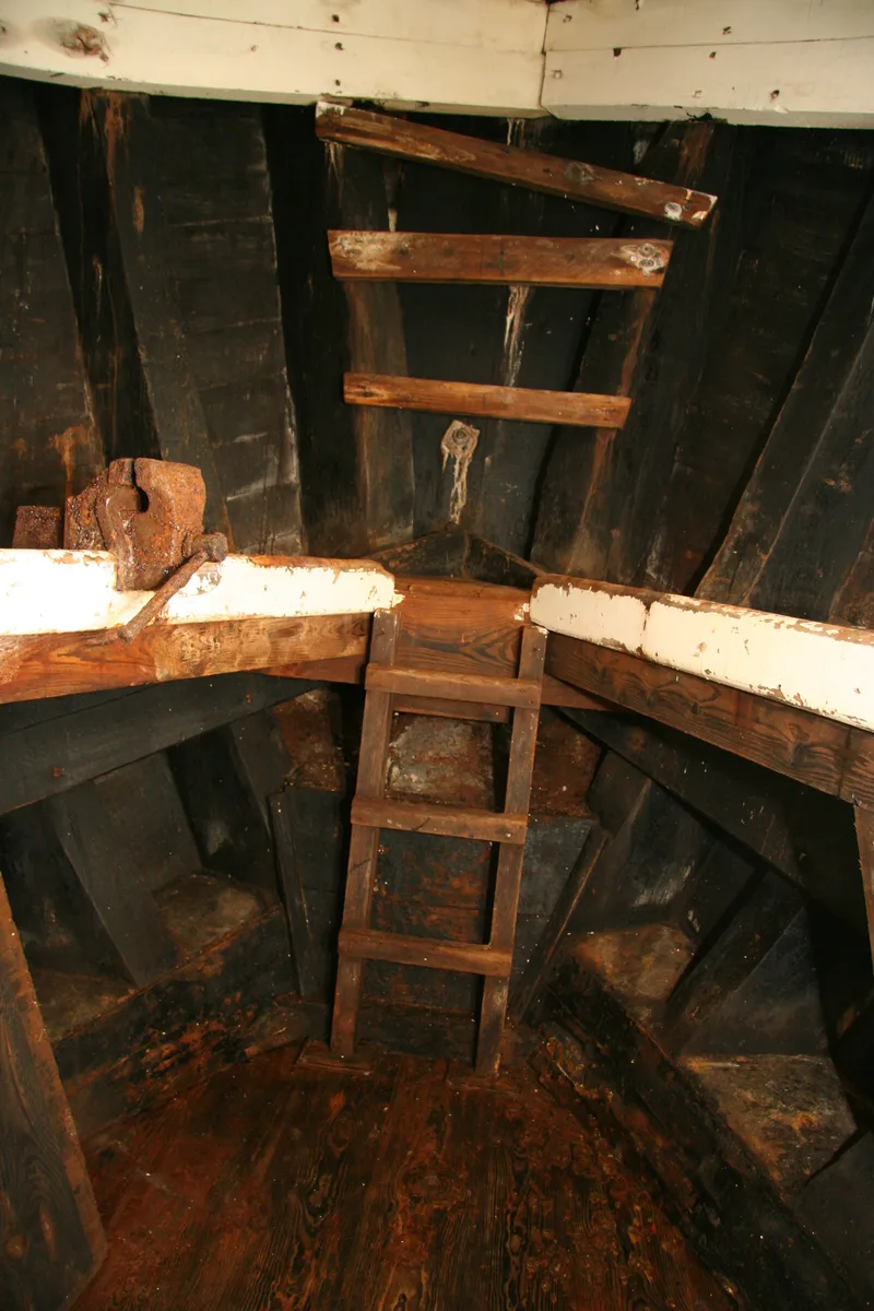 Old oak beams in the bow of a wooden fishing trawler